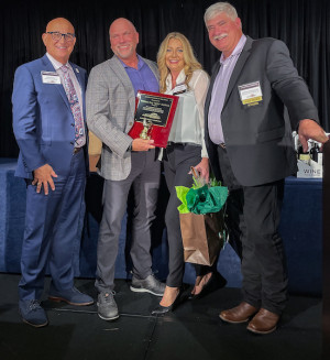 Billy Hufford receiving the award on stage